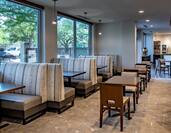 Booth Seating by Large Windows, Tables, and Chairs in Urban Mustang Restaurant Seating 