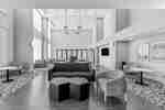 Spacious lounge area with contemporary seating, stylish lighting, and a welcoming social atmosphere.