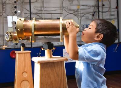 Child with Telescope