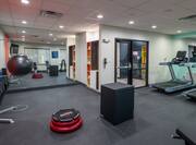 Fitness Center with Weights and Modern Equipment