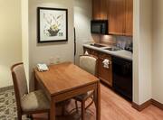 Suite Kitchen With Dining Table and Chairs