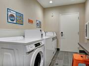 Laundry room with machines