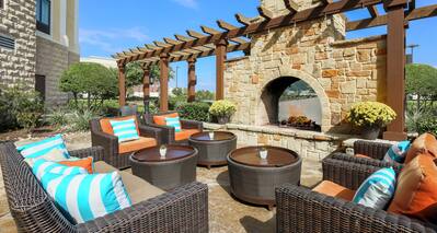 Outdoor Lounge and Patio Area with Fire Pit and Pergola