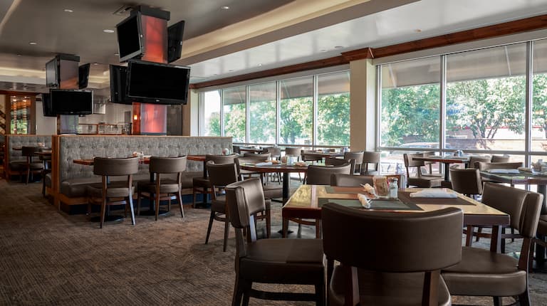 Sports Page Grill Dining Area with Large Windows