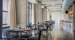 Loft Restaurant Dining Area with Large Windows
