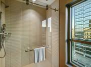 Standalone Shower with Glass Door in Guest Bathroom