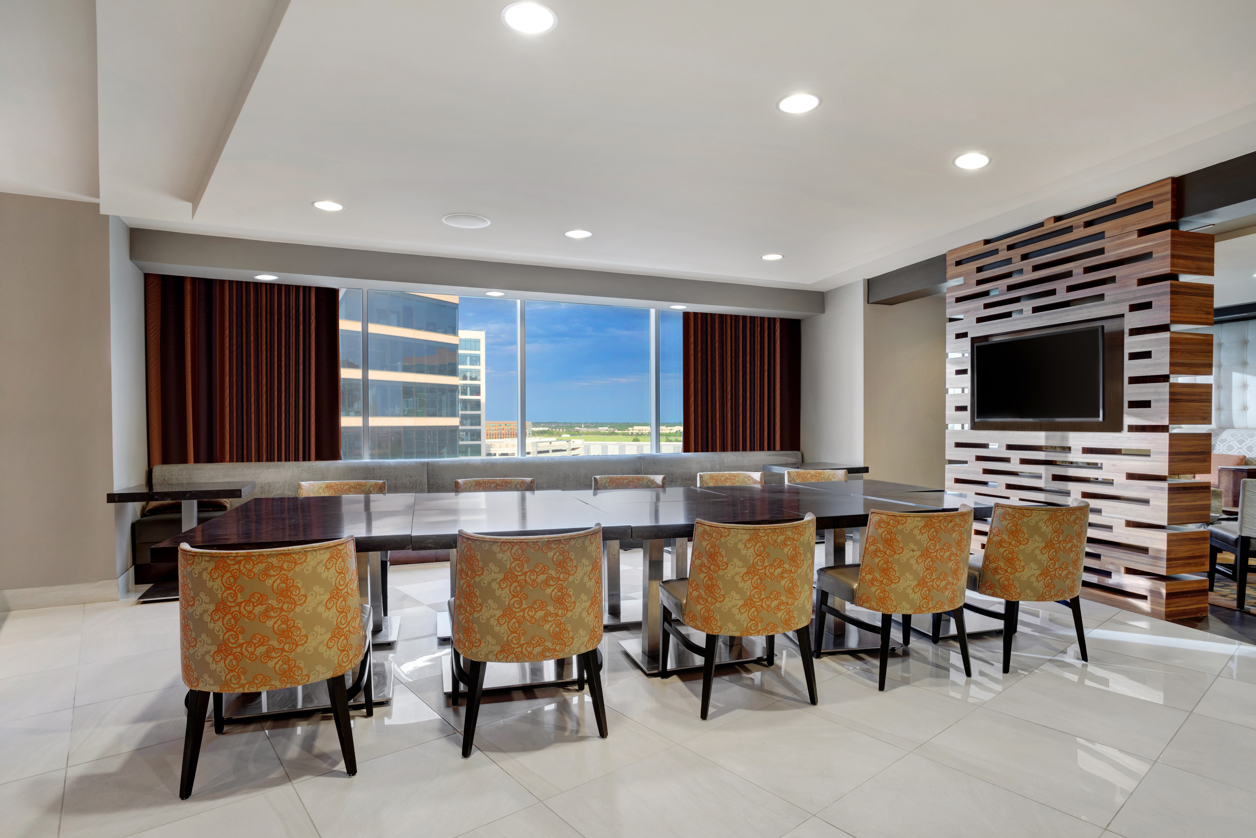 executive lounge community table and large windows