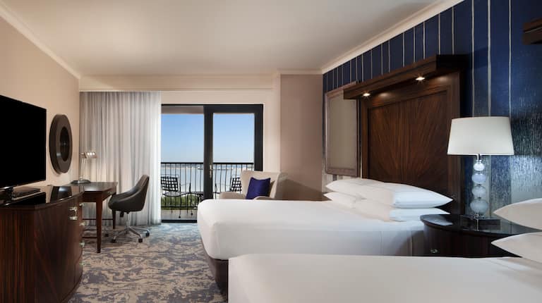 Queen Guest Room and Balcony with Resort View