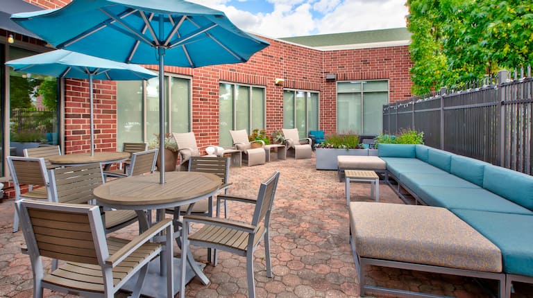 outdoor patio, patio furniture, umbrellas 