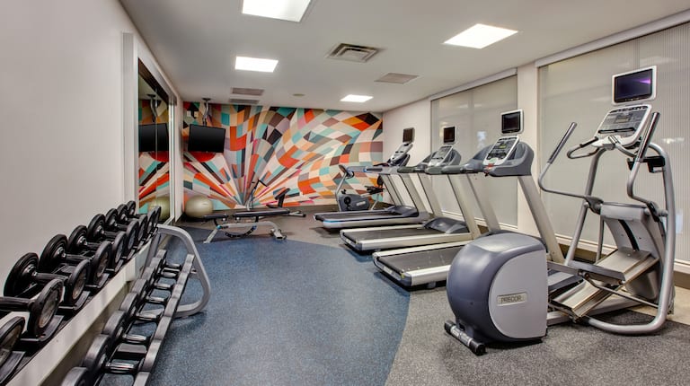 on site fitness center, treadmills, elliptical, free weights
