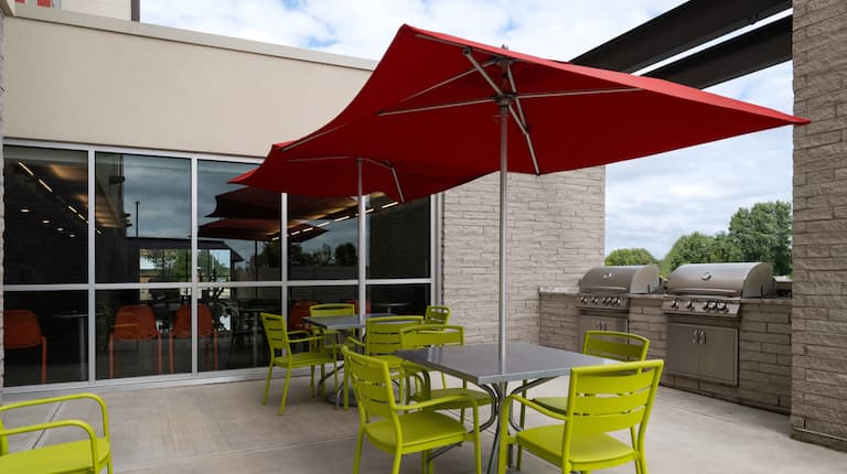 outdoor patio, tables, chairs, umbrellas