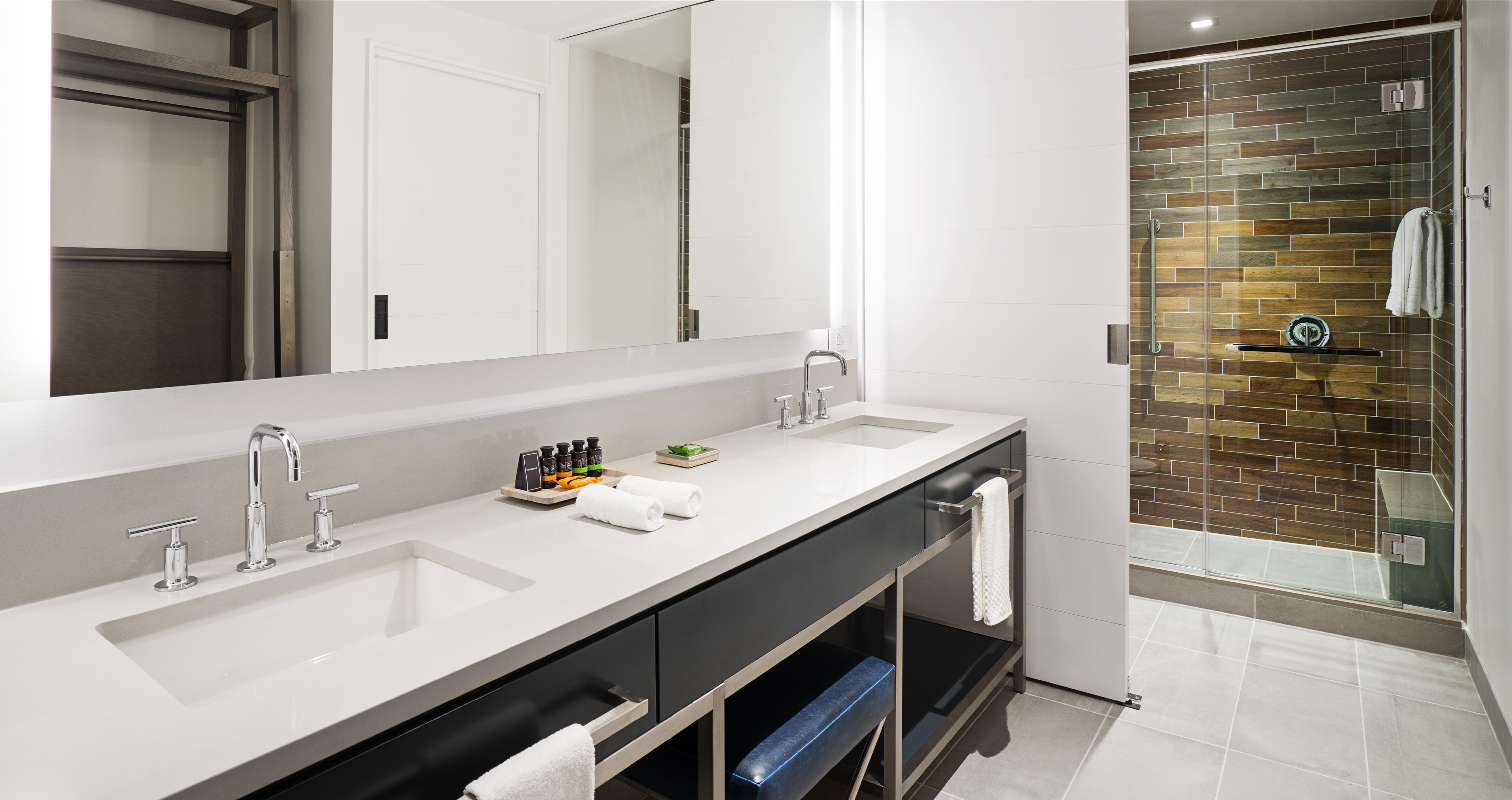 Guest Bathroom with Large Mirror, Two Sinks and Walk-In Shower