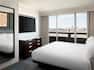 Large Bed in Hotel Suite with HDTV