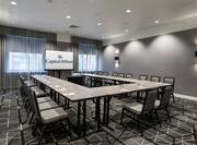 Ohio Meeting Room with U-Shaped Table, Chairs, and Projector Screen