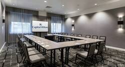 Ohio Meeting Room with U-Shaped Table, Chairs, and Projector Screen