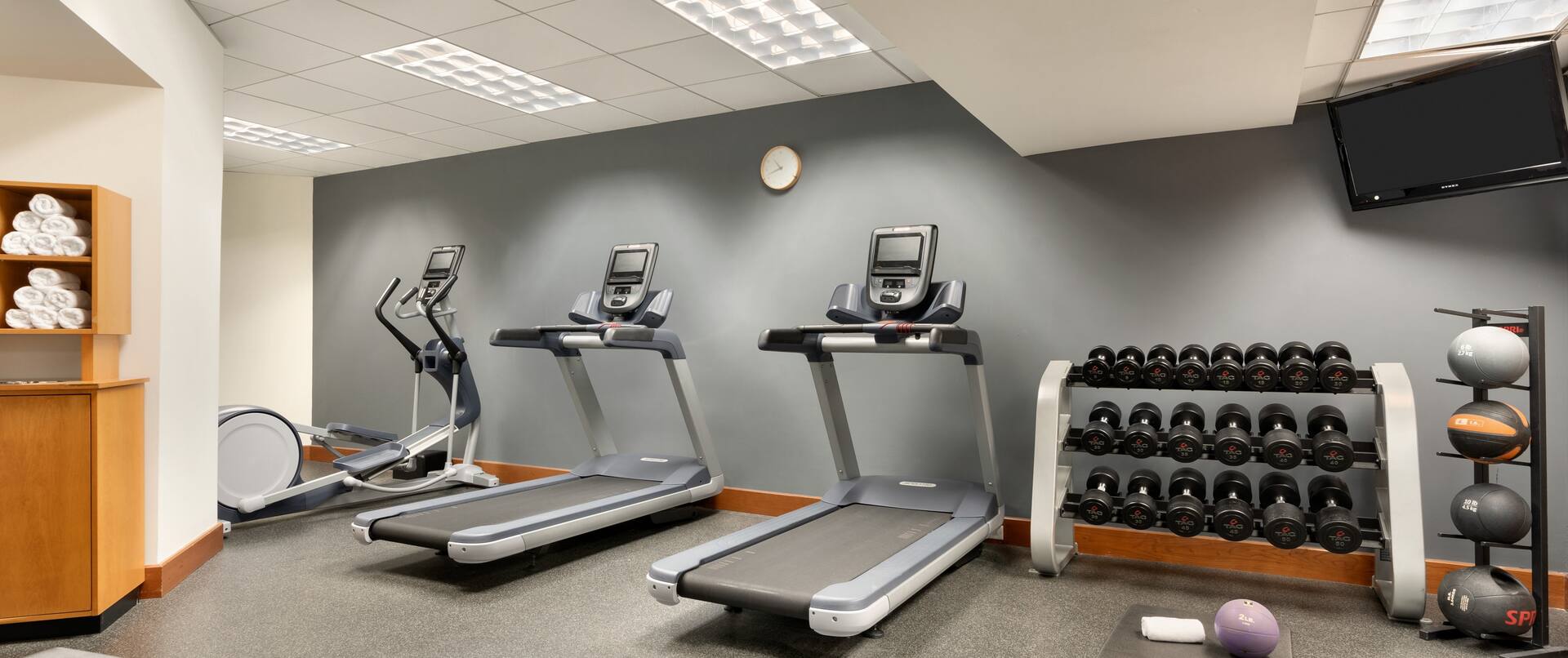 Fitness Center with Treadmills, Cross-Trainer, Dumbbell Rack and Weight Bench