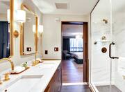 Chief of State Guest Bathroom with Dual Vanity Area and Shower with Sliding Glass Doors