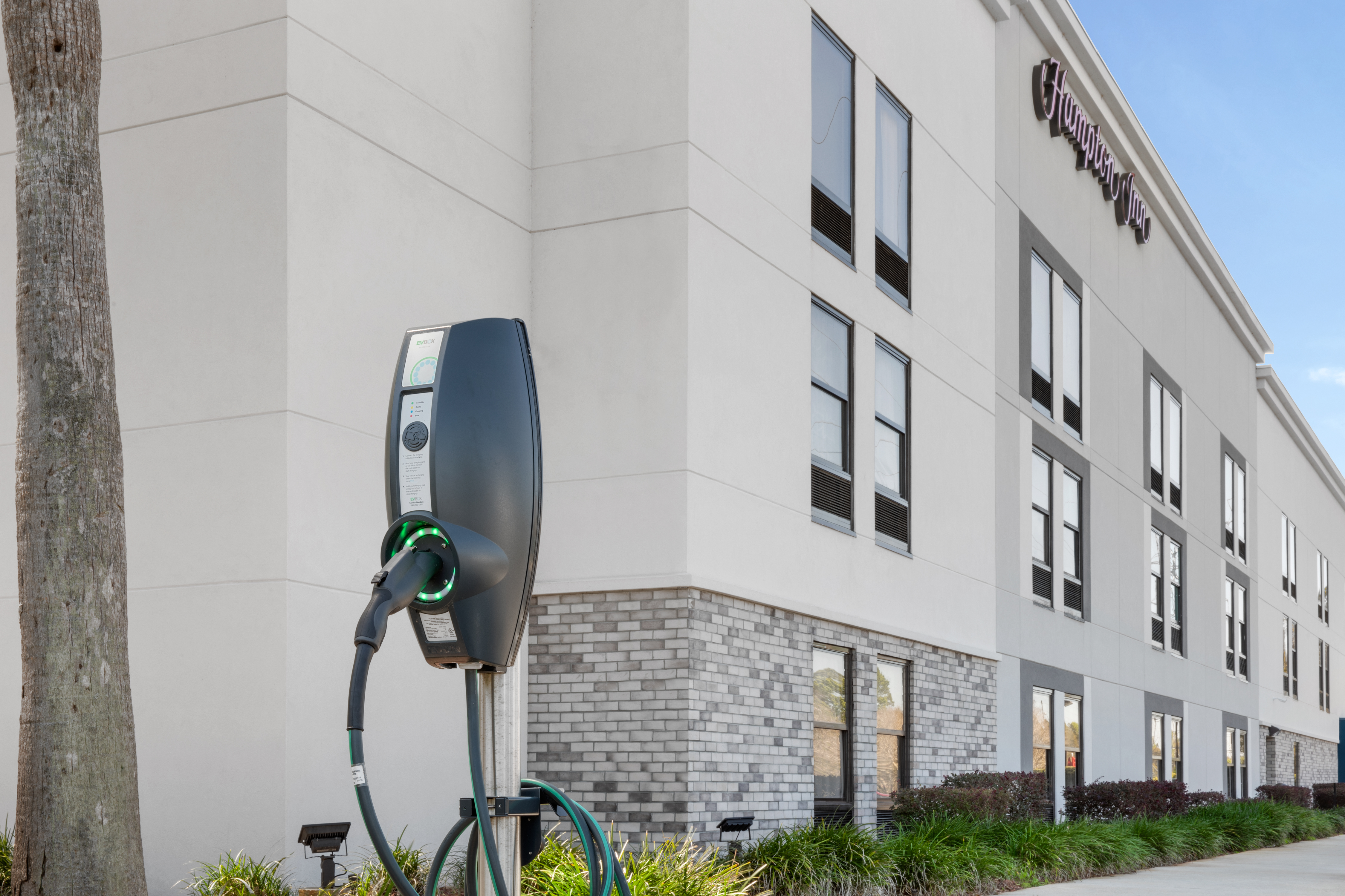 Electric Car Charger in Hotel Parking Lot