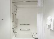 Accessible Guestroom Bathtub with Grab Bars and Seat