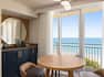 Bright dining area with wet bar with beautiful Oceanfront views