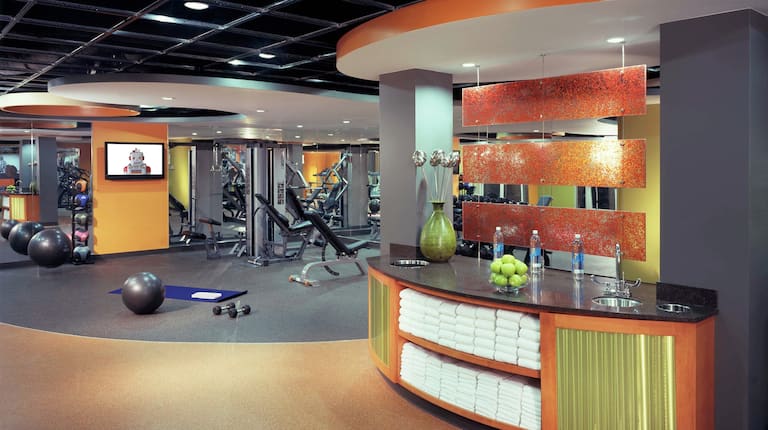 Hotel Fitness Center Front Desk and Weight Equipment