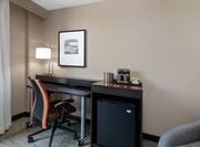 Guestroom Details With Work Desk & Fridge