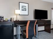 Guestroom Details With Work Desk & TV