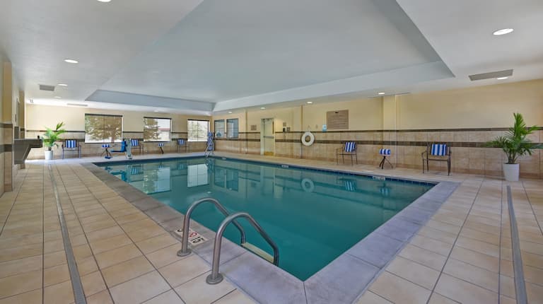 indoor swimming pool with seating
