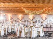 Wedding Reception in Meeting Space with tables and chairs