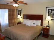 Suite with Luxurious King Bed and Night Tables 