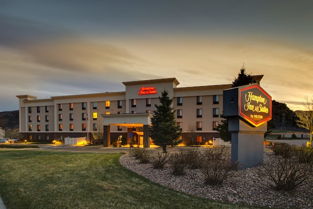 Hotel Exterior With Sign at Twilight