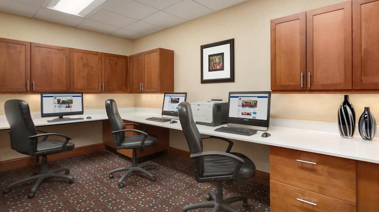 Business Center with Long Desk, Chairs, Computers and Printer