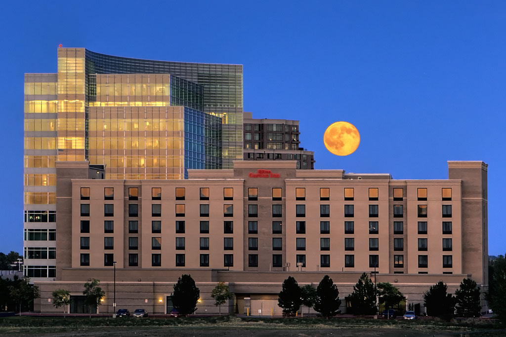 Hotel exterior with moon in sky