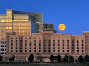 Hotel exterior with moon in sky