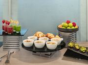 Fresh Fruits Breads and Juices Setup in a Meeting Room