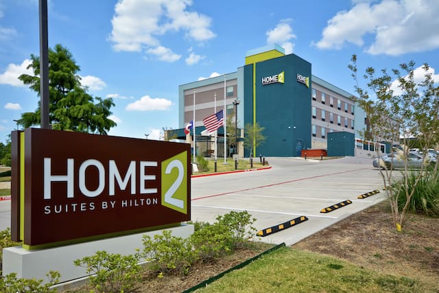 Hotel Exterior Daytime with Sign