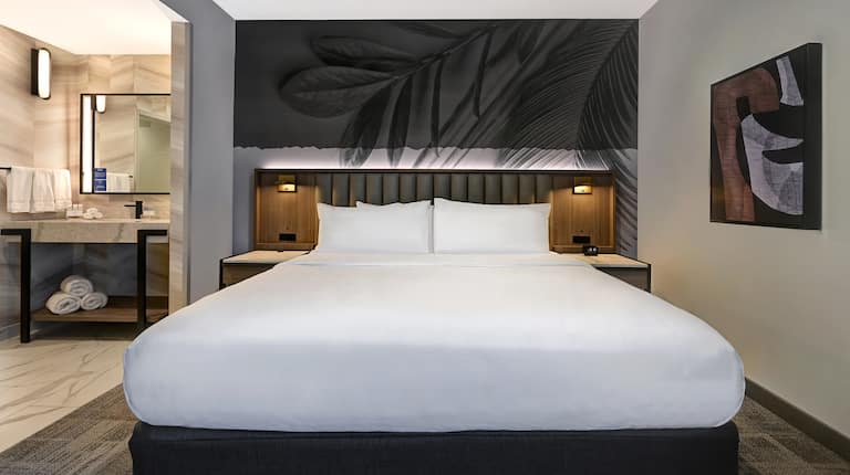 King Bedroom And Bathroom Vanity Area