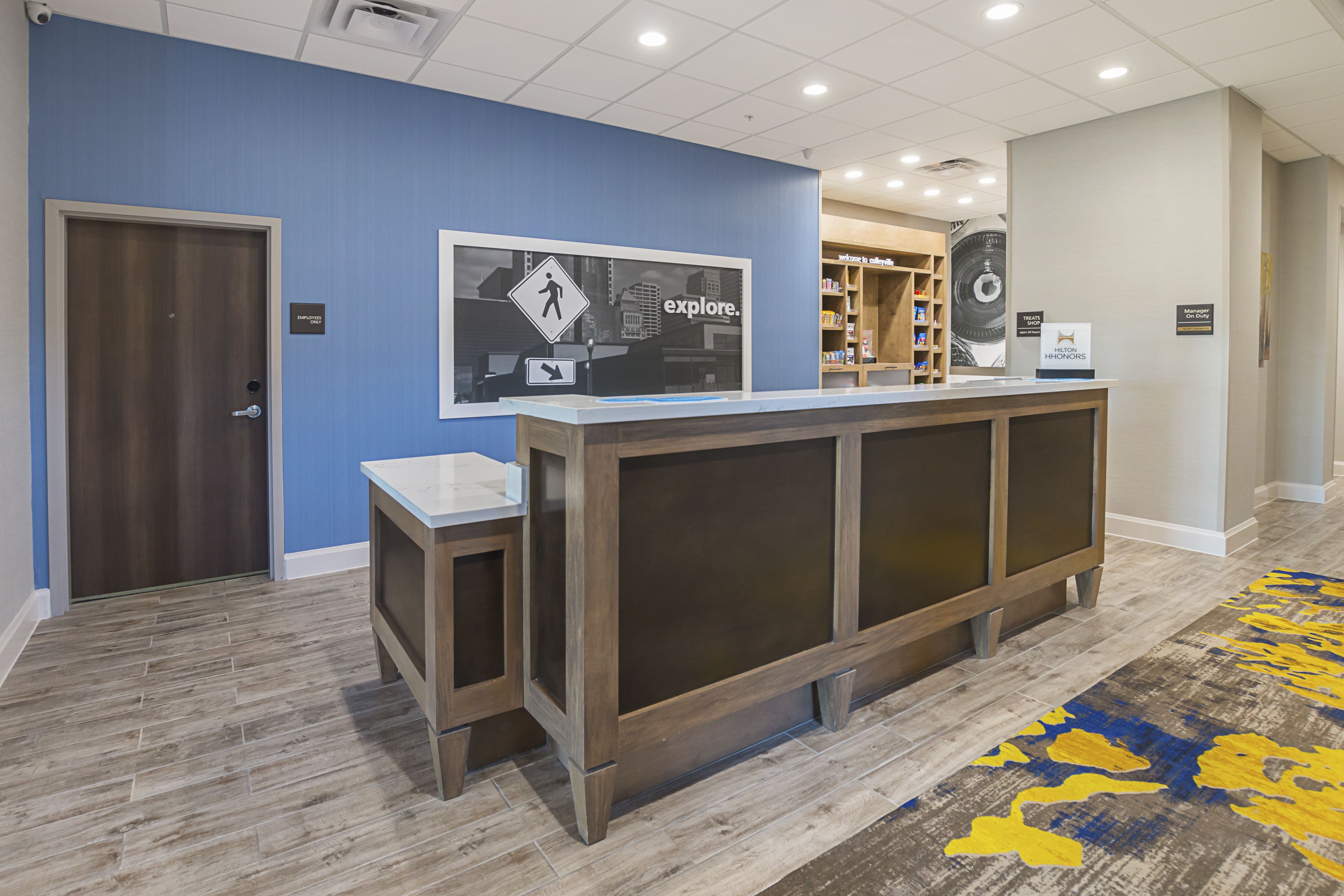 Hampton Inn DFW front desk with
  accessible counter 
