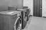 laundry room with washer and dryer