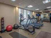 Fitness Center with Treadmills, Elliptical Machines, Medicine Balls, and Basketballs