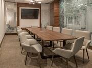 Boardroom with Table, Chairs, and Room Technology