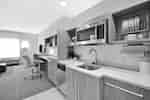 Fully Equipped Kitchen with sink and microwve
