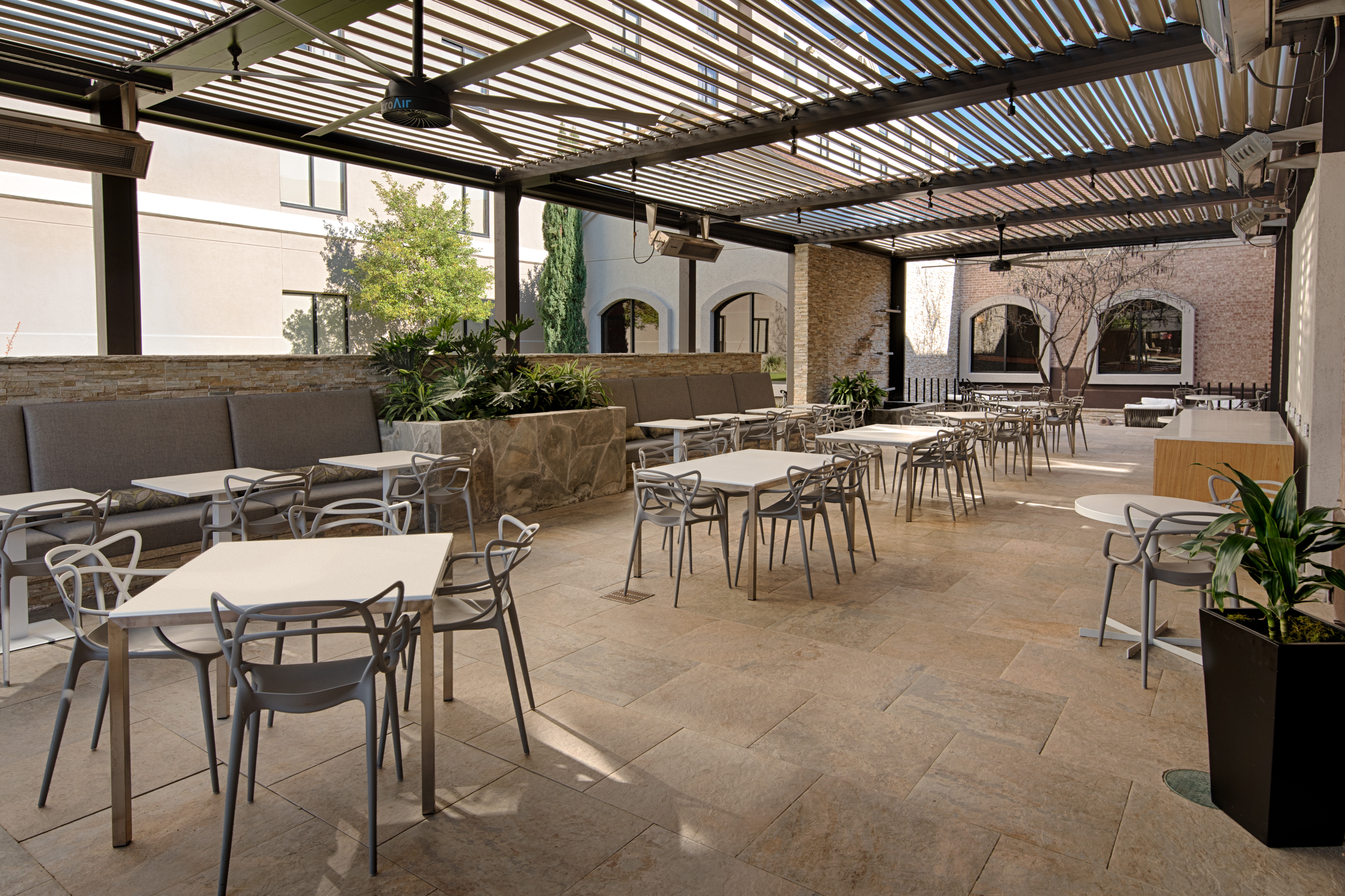 Outdoor Patio Seating Area with Tables and Chairs