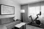 guest suite, sofa, coffee table, Peloton bike