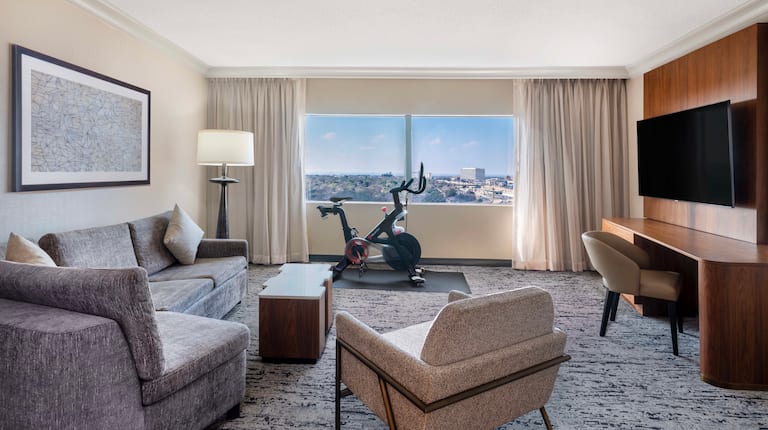 guest suite, lounge area, tv, Peloton bike