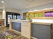 Front Desk Reception Area with On-Site Snack Shop