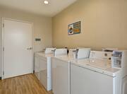 Guest Laundry Room with Tumble Dryers