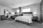 King Bed Guestroom with Sofa, Footrest and Armchair