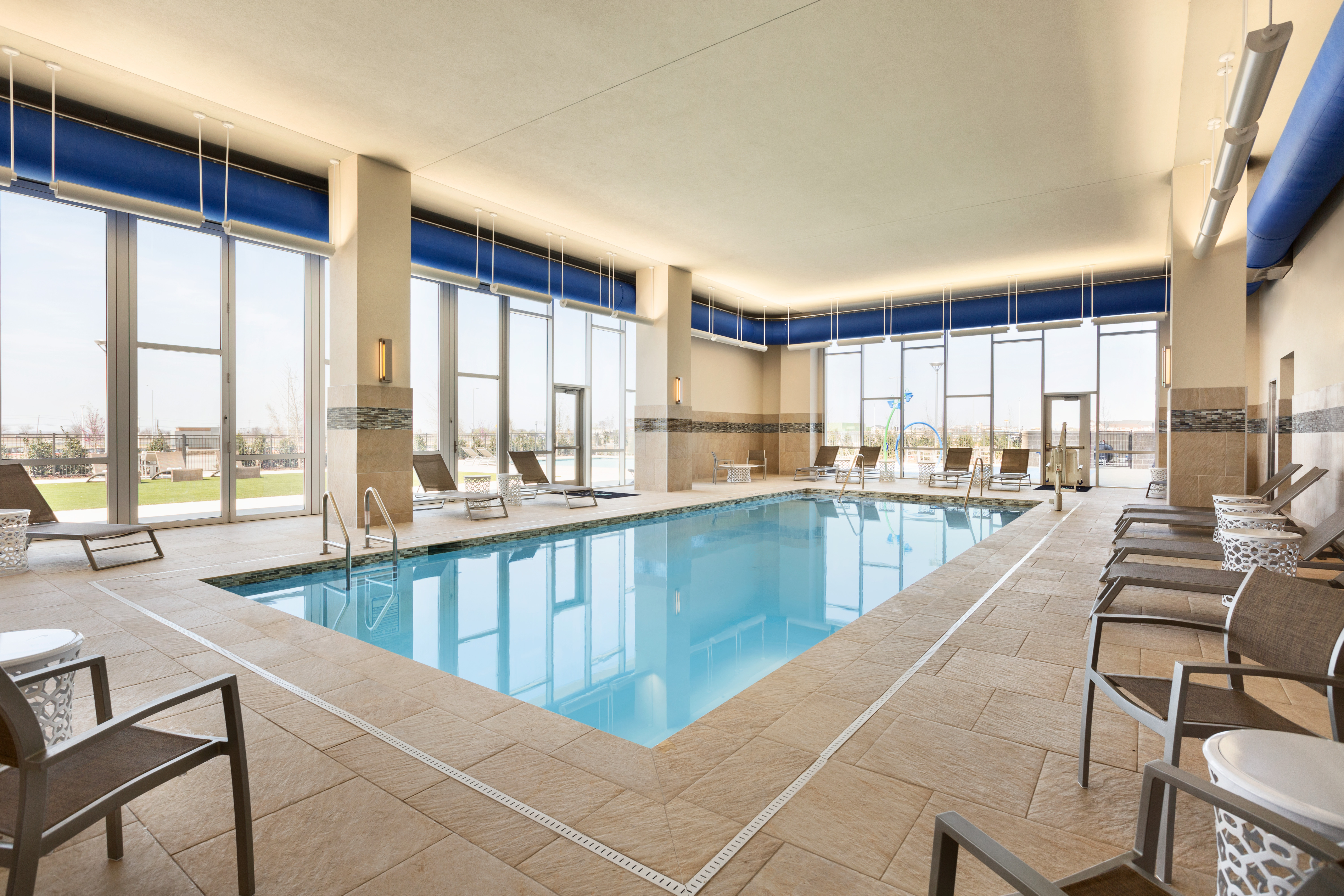 Indoor Swimming Pool with Lounge Chairs
