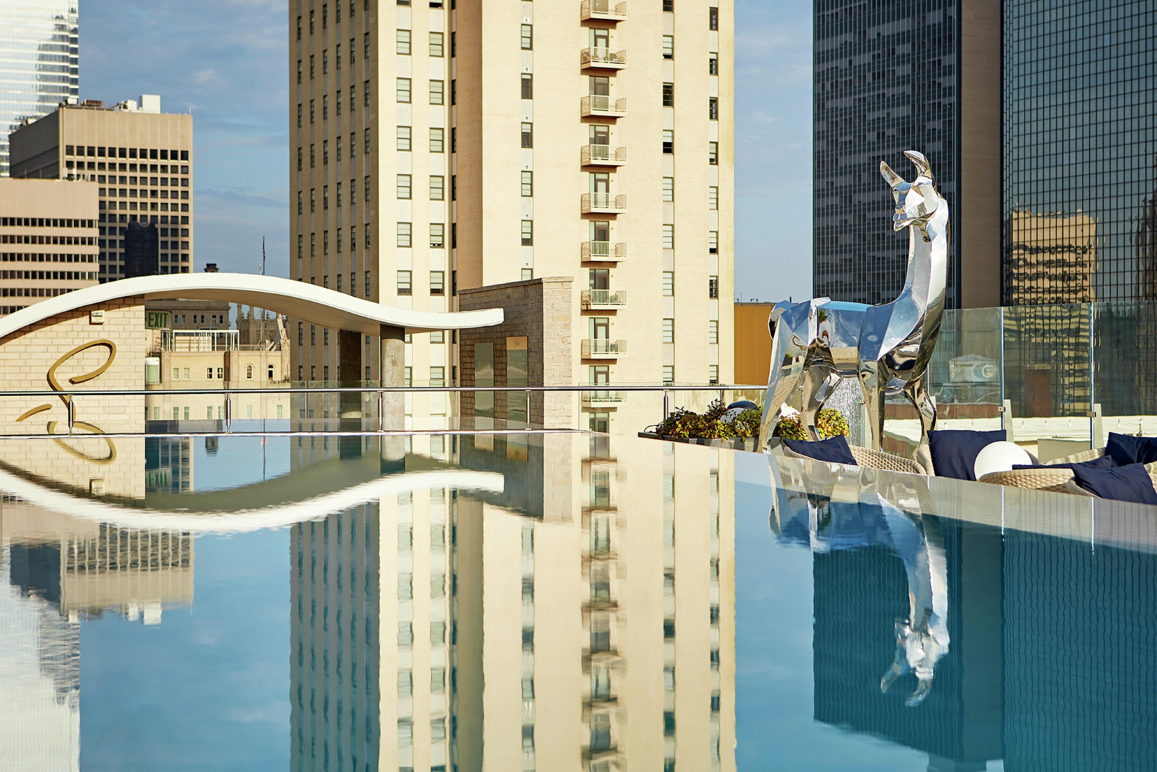 Llama Sculpture Next to Rooftop Pool